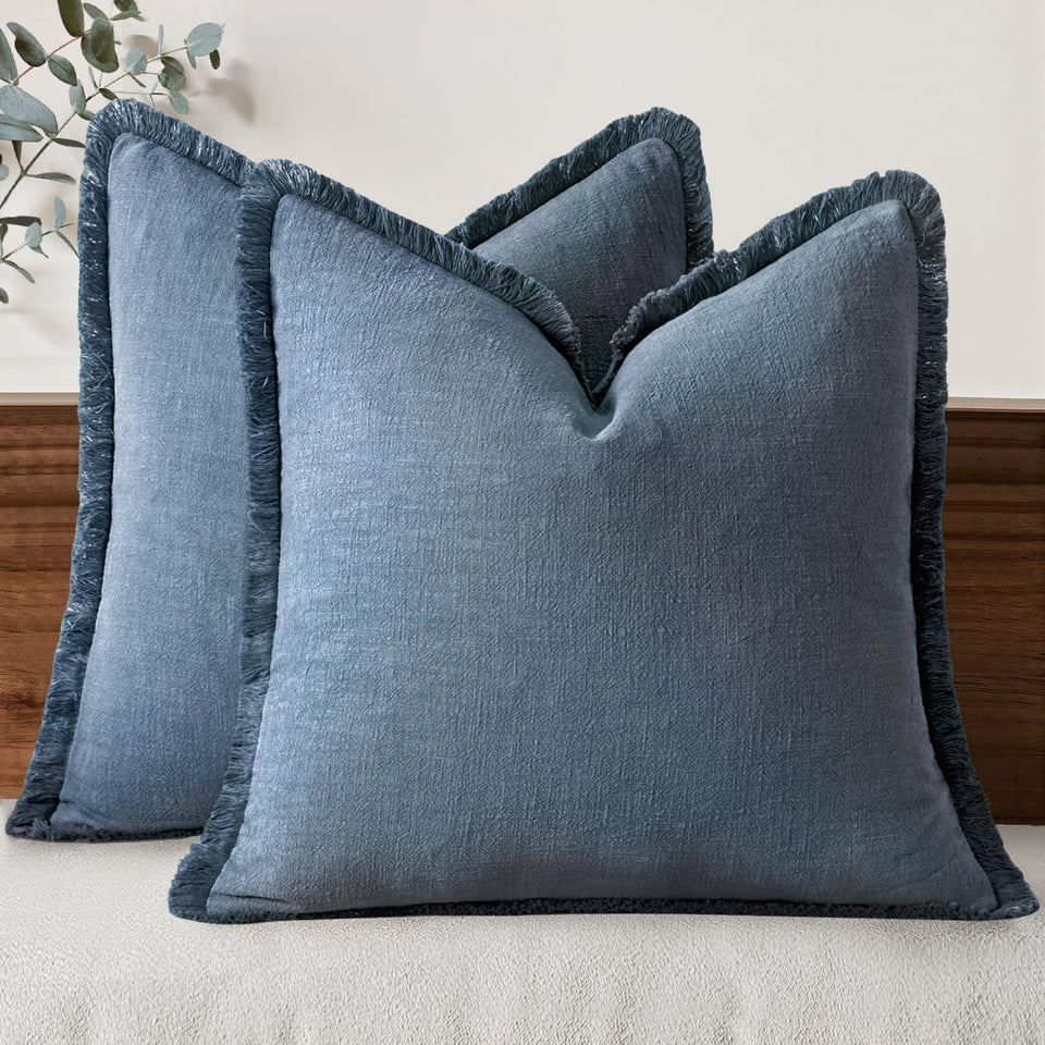 MIULEE linen pillow cover with neutral blue fringe, 20x20 displayed on sofa for cozy style.