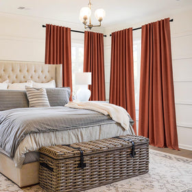 MIULEE linen-texture blackout curtains in burnt orange enhance room ambience.