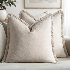 MIULEE linen throw pillow cover with natural beige fringe enhances rustic sofa styling.