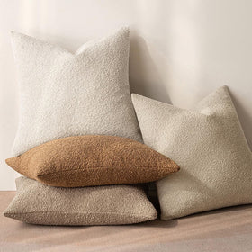 MIULEE neutral pillow case demonstrates versatile styling with textiles.