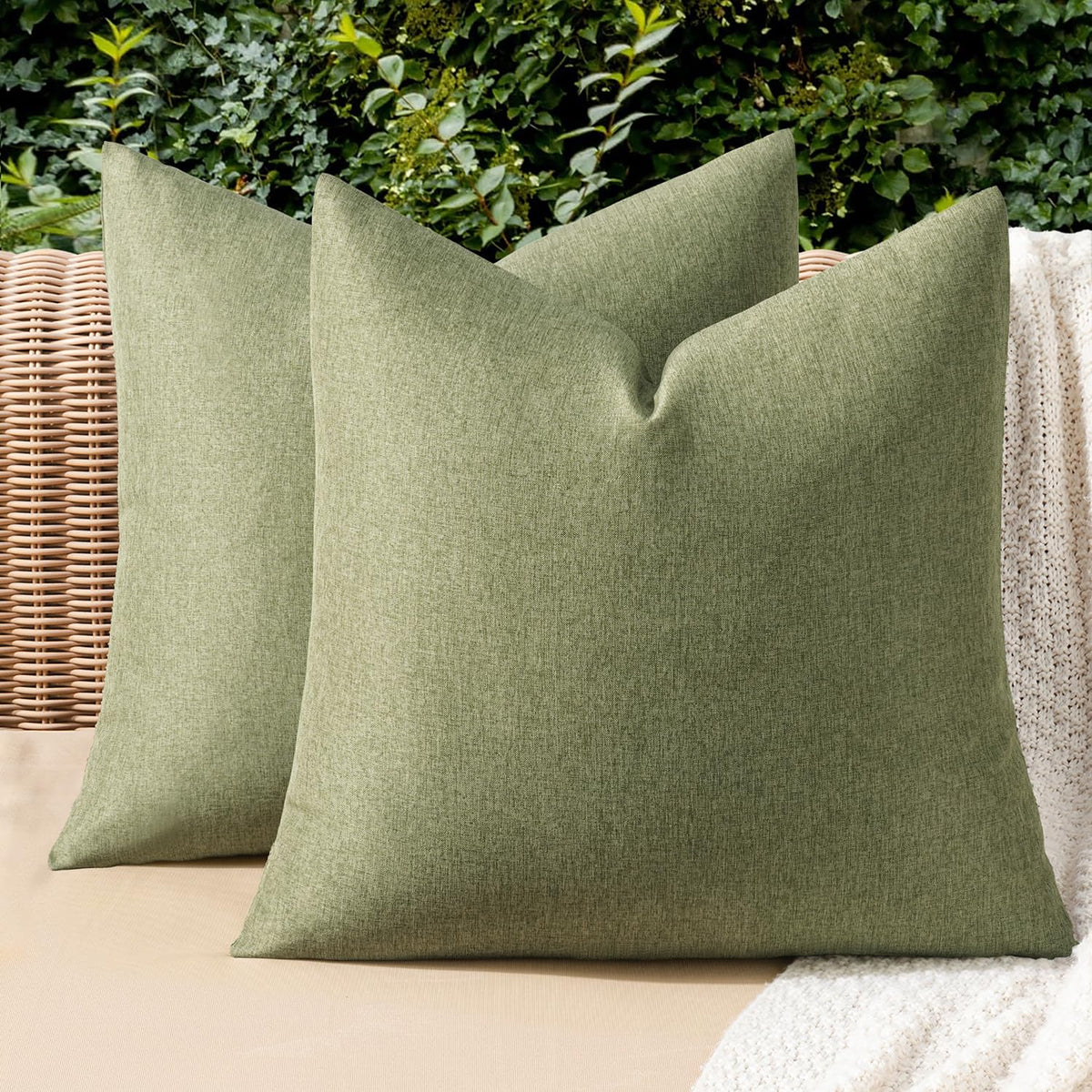 MIULEE dark green outdoor pillow cover (20x20) on patio decor.