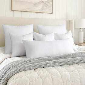 MIULEE pillow insert being fluffed to boost fullness and comfort