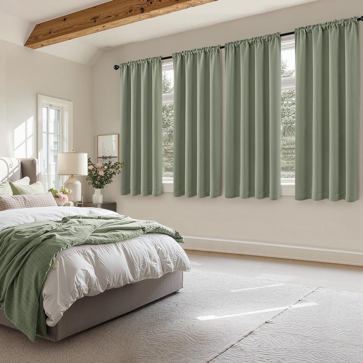 MIULEE sage green blackout curtains in bedroom setup with soft ambient light.