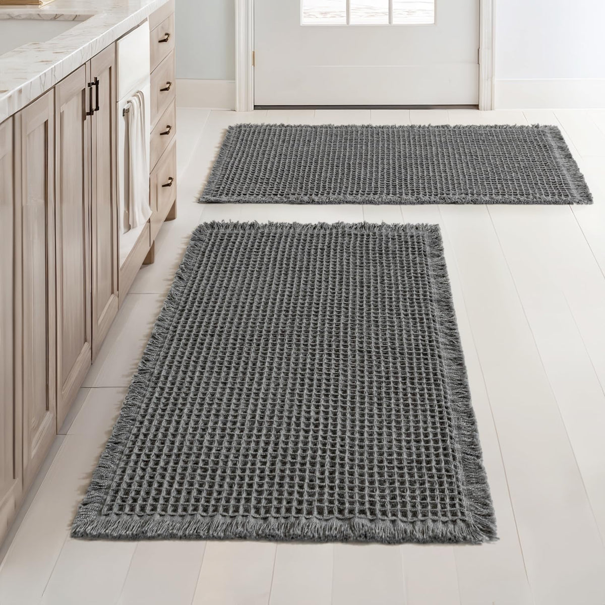 MIULEE set of 2 waffle bath rugs with absorbent texture for quick foot drying.