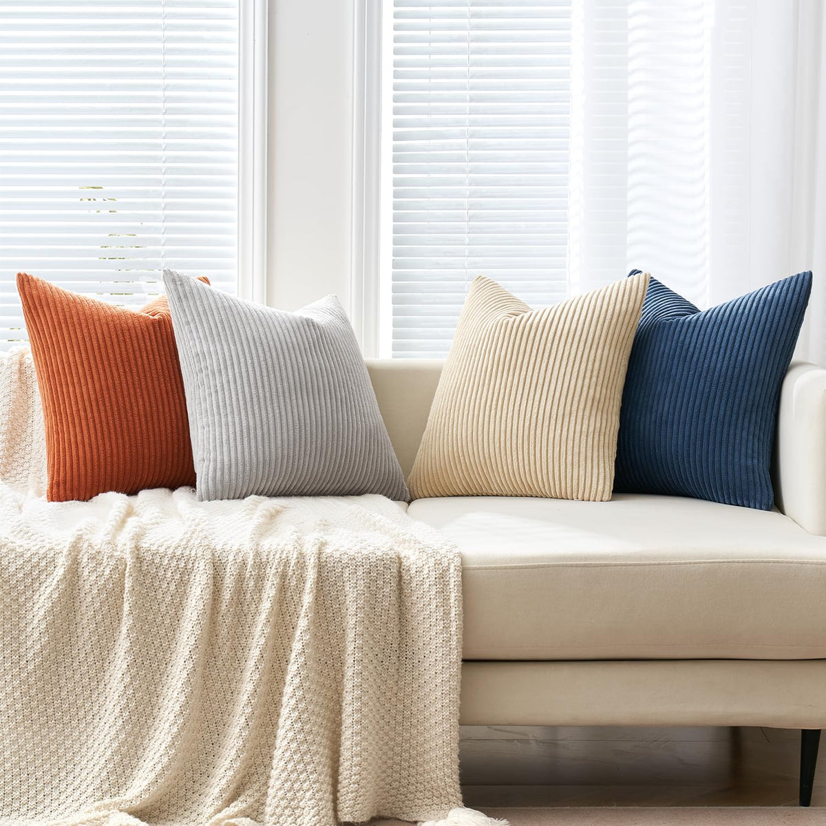 MIULEE four-piece pillow cover set for cohesive living room styling.