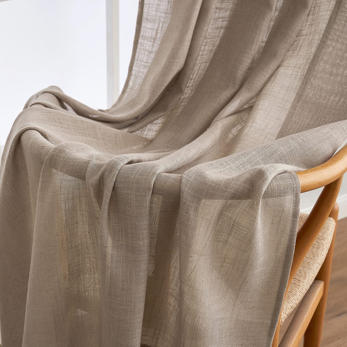 MIULEE Taupe Linen Curtains paired with blackout panels for complete control.