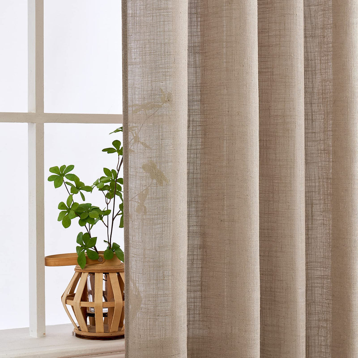 MIULEE Taupe Linen Curtains privacy-friendly fabric diffuses light without full opacity.