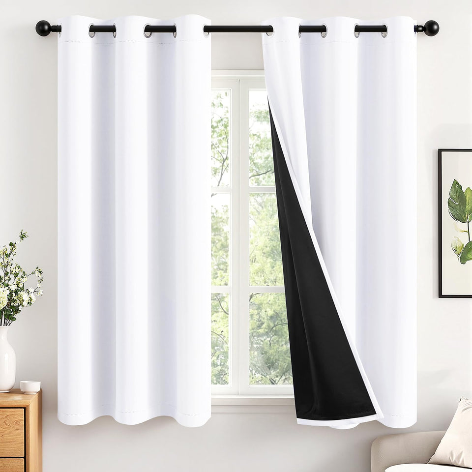 MIULEE white blackout curtains, 63 inch two-panel set, blocks sunlight for deep sleep.