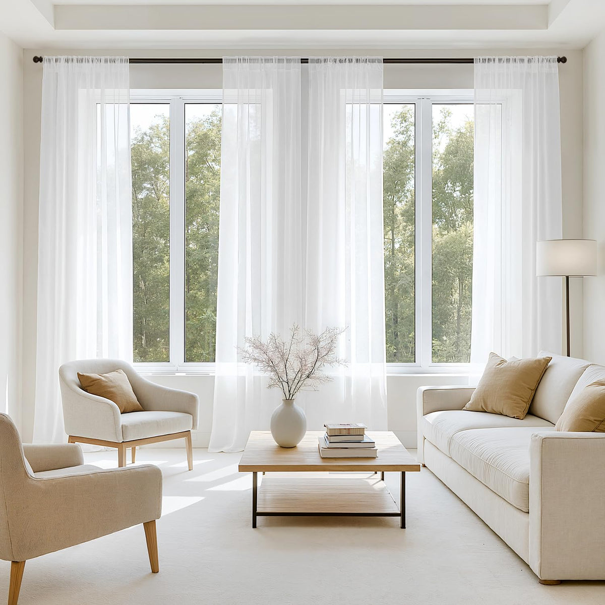 MIULEE White Sheer Curtains four-panel set framing a bright living room with soft daylight.