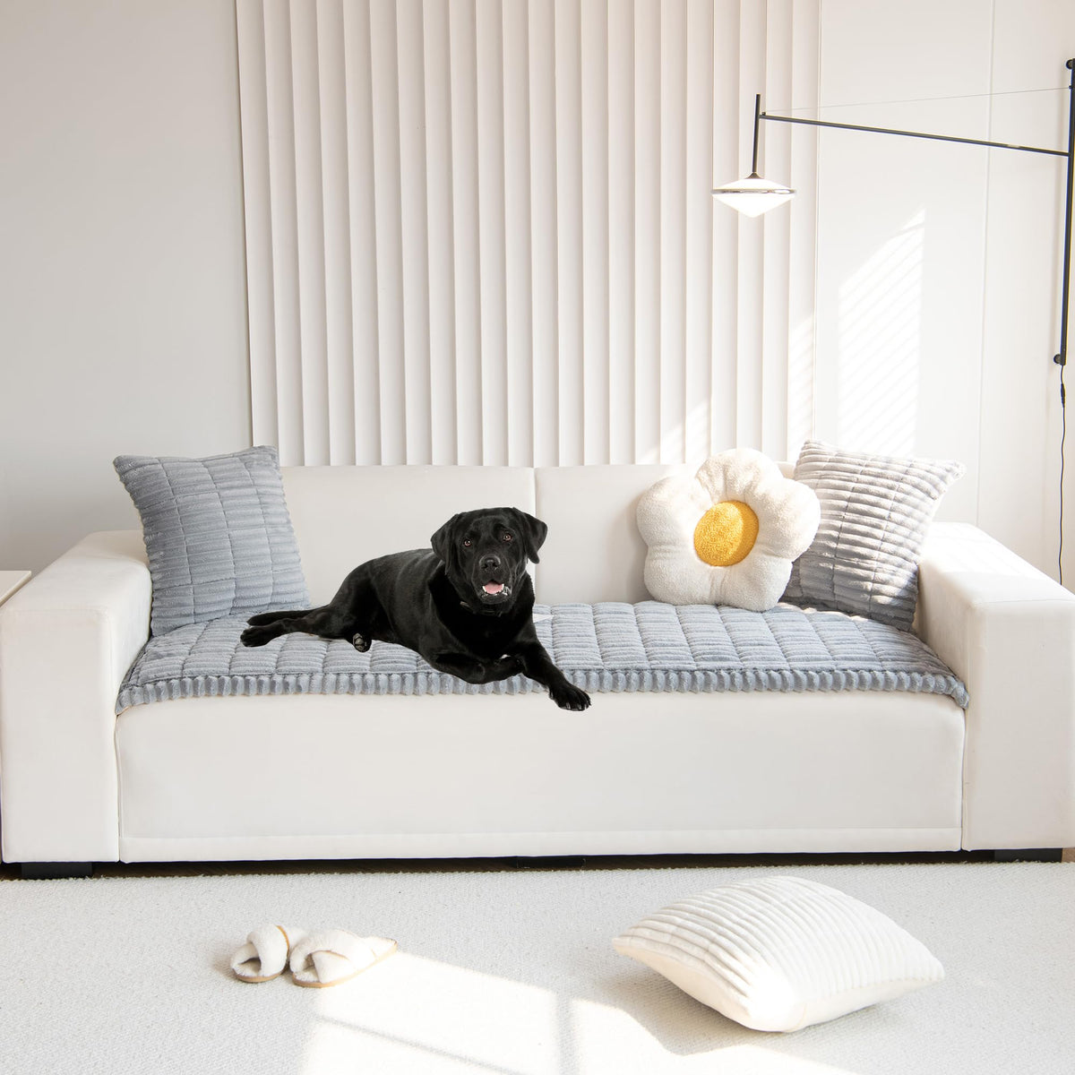 Mivnue pet couch cover back view highlights non-slip backing on sofa.