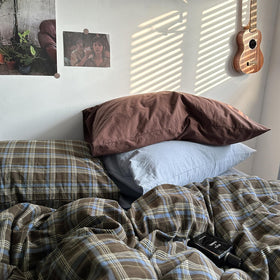 Mixinni full 3-piece set styled on bed for versatile decorating options.