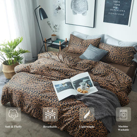 Mixinni leopard-print comforter fabric close-up shows soft texture and plush feel.