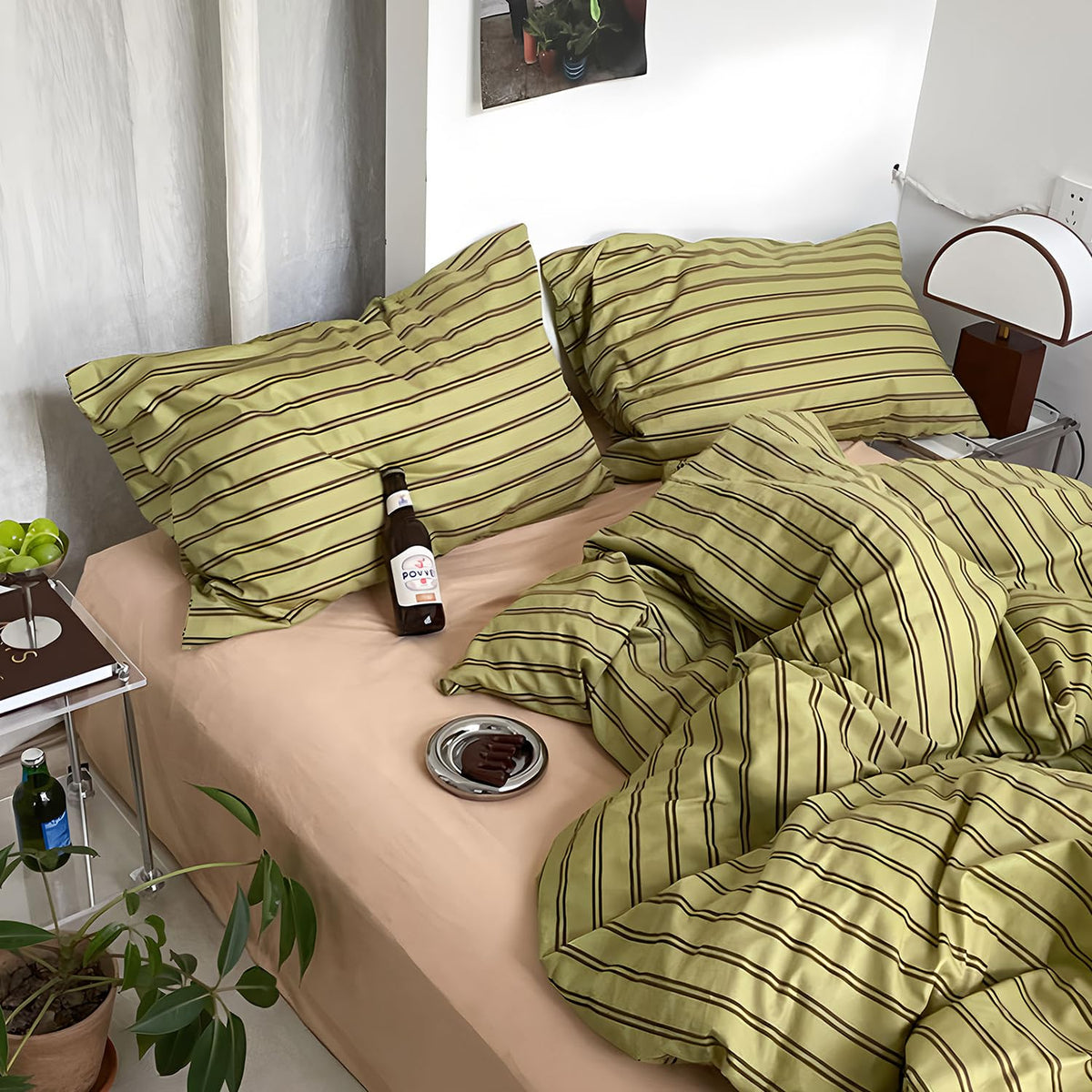 Mixinni olive-taupe stripes fabric closeup highlights soft, airy cotton texture.