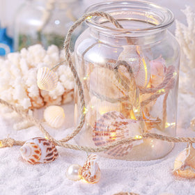 MIYA LIFE nautical garland with shells adds playful beach room accents