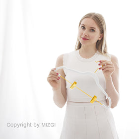 MIZGI Dorm-room ready hangers keep outfits neat in tight spaces.