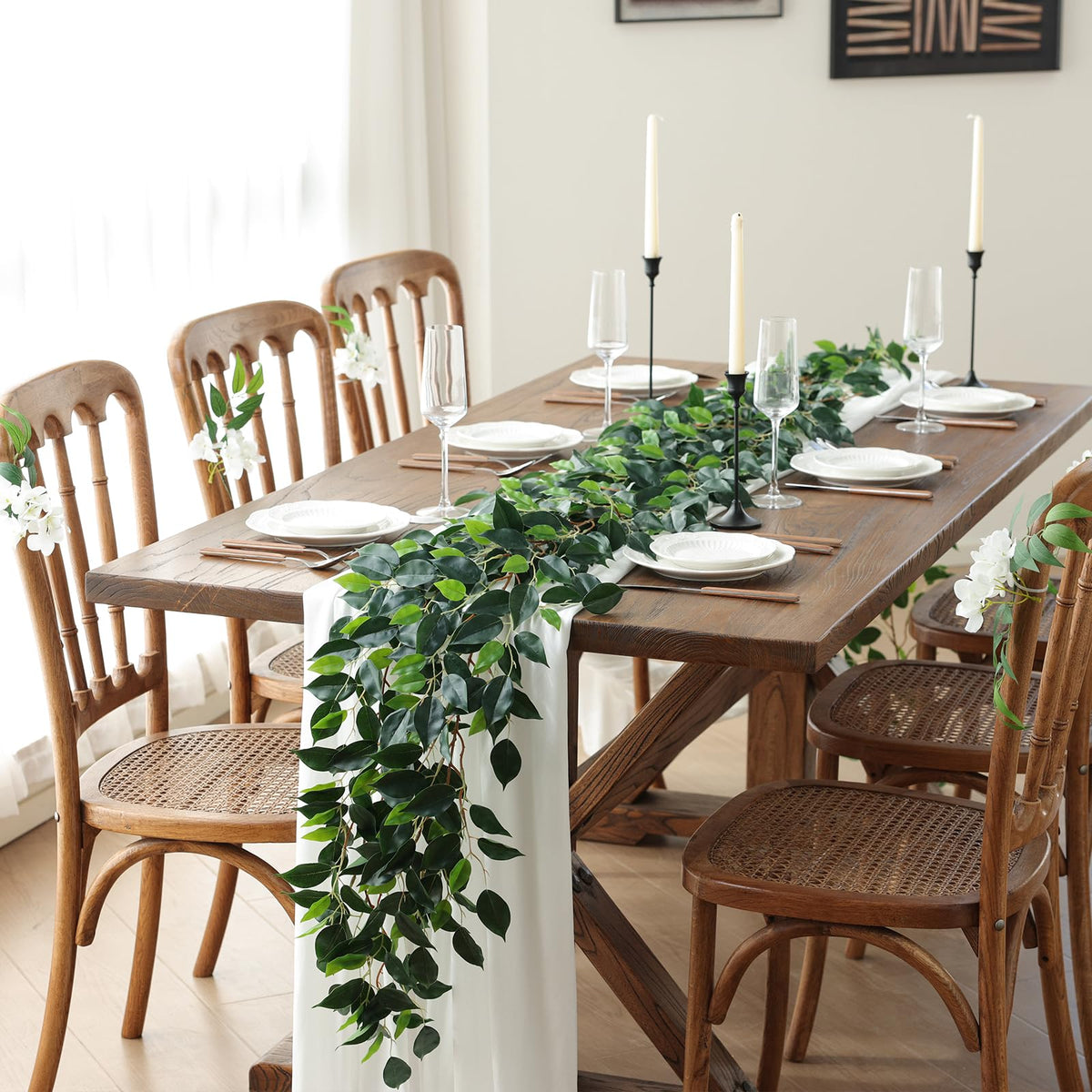 Mizii ficus garland as a table centerpiece with greenery.