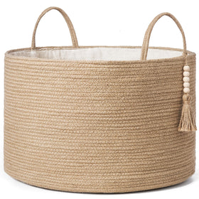 Mkono extra large laundry basket with tassel for stylish storage and easy transport.