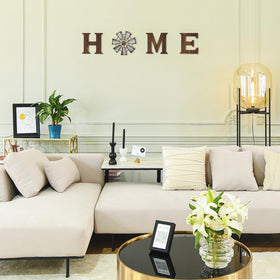 Mkono windmill O sign brings coastal charm to any room.