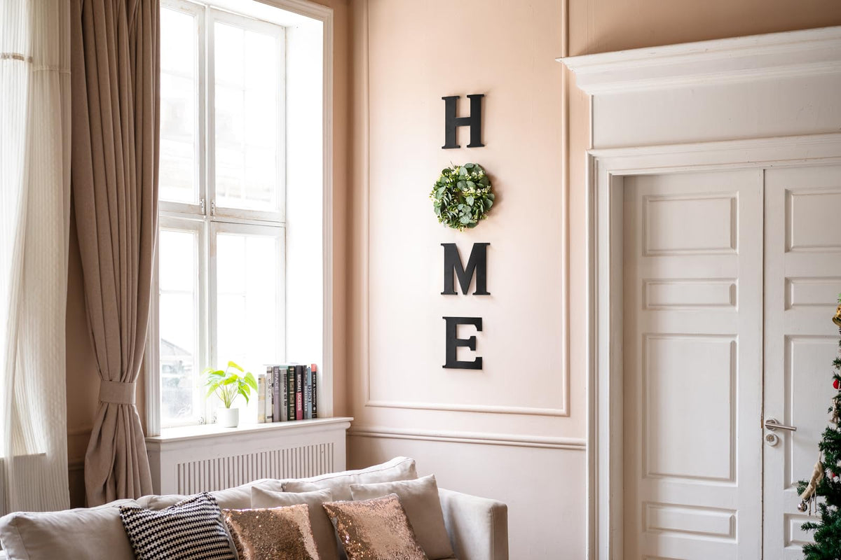 Mkono Farmhouse wall sign letter M enhances living room rustic vibe.