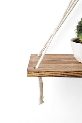 Mkono floating shelves in nursery for toys and keepsakes
