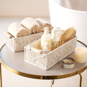 Mkono ivory woven baskets in home setting for chic storage.