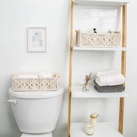 Mkono macrame bathroom decor baskets in ivory brighten shelves and counters.