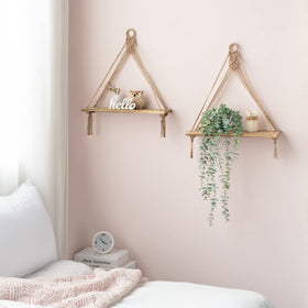 Mkono wooden floating shelf displaying photos and keepsakes
