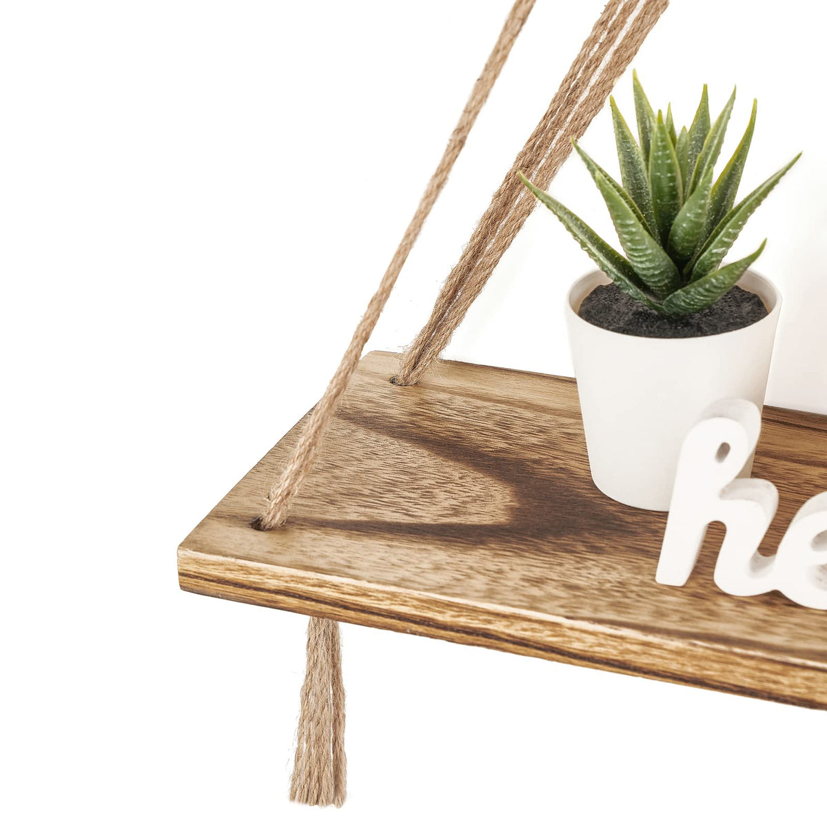 Mkono tassel-hung shelf adding texture in a dorm room