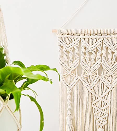 Mkono wall hanging displayed in a cozy bedroom setting.