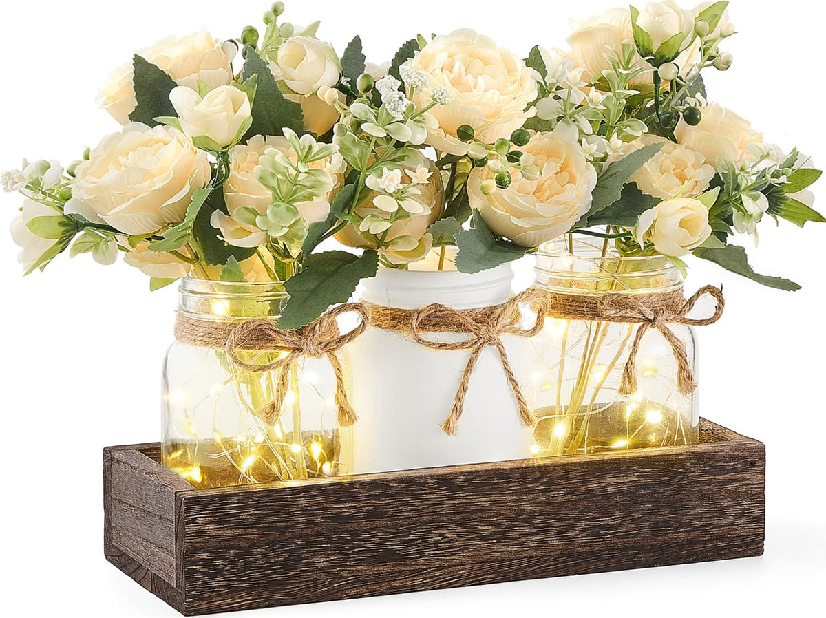 Mkono mason jar lights centerpiece on wood tray adds warm rustic charm.