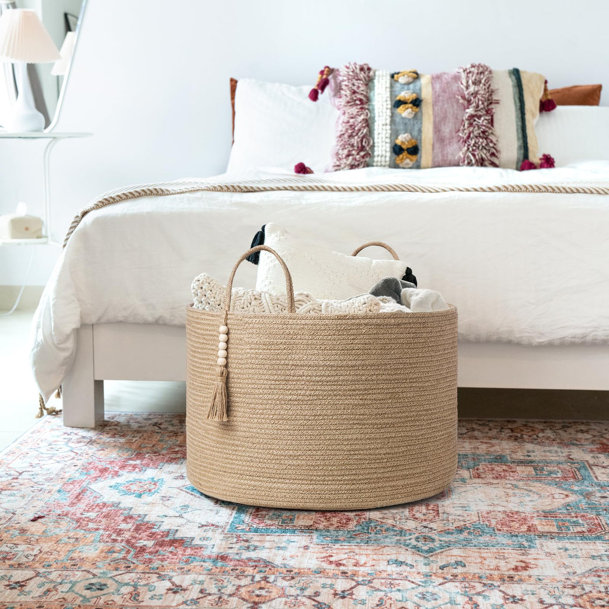 Mkono multiuse storage basket by the front door for quick organization of toys and accessories.