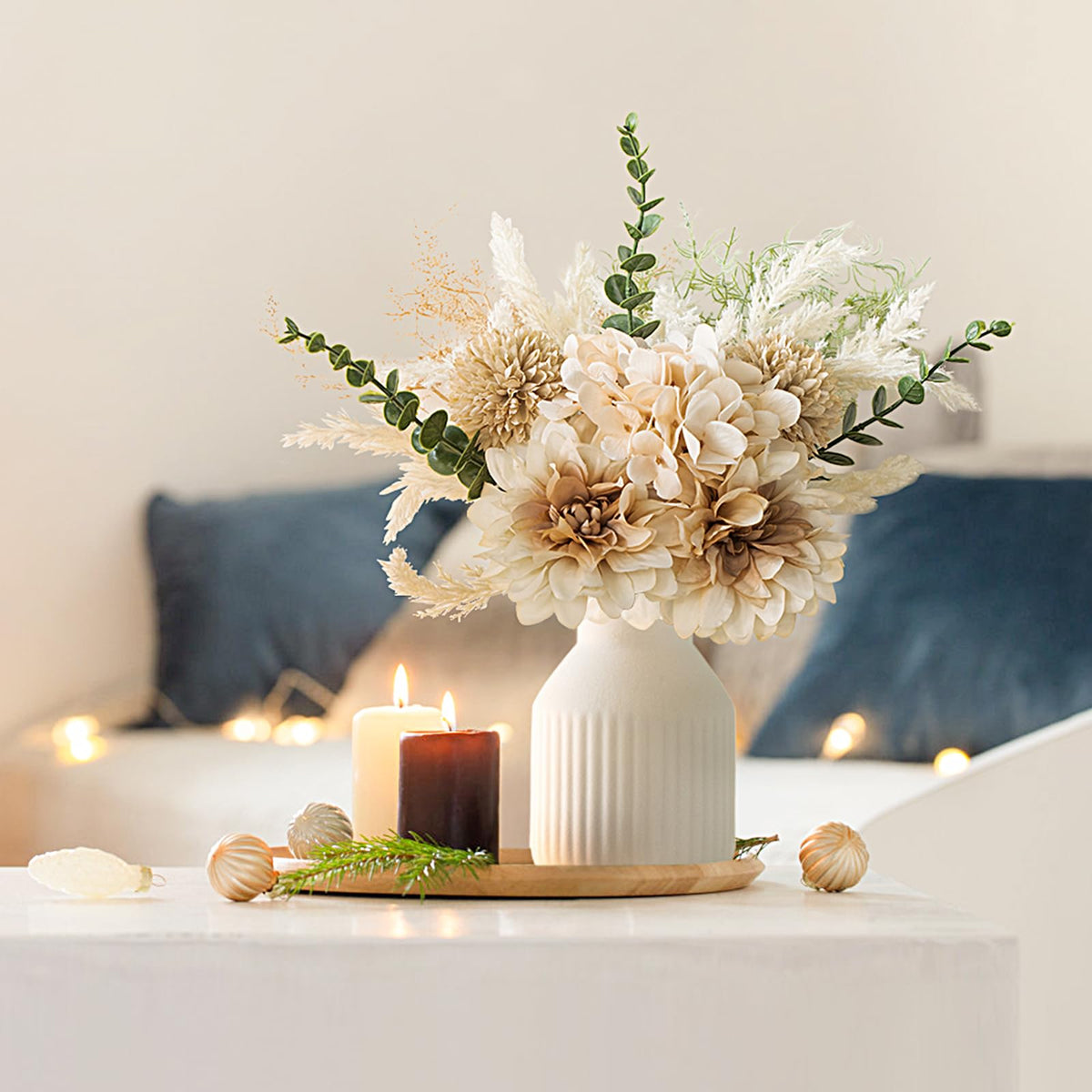 Mkono bouquet featuring dandelion and eucalyptus in a vase for cozy living room decor.