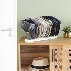 Mkono table-top hat rack shows a wood base and metal frame for durable display