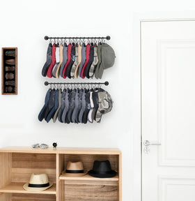 Close-up of Mkono wall-cap organizer showing adjustable hooks for flexible display.