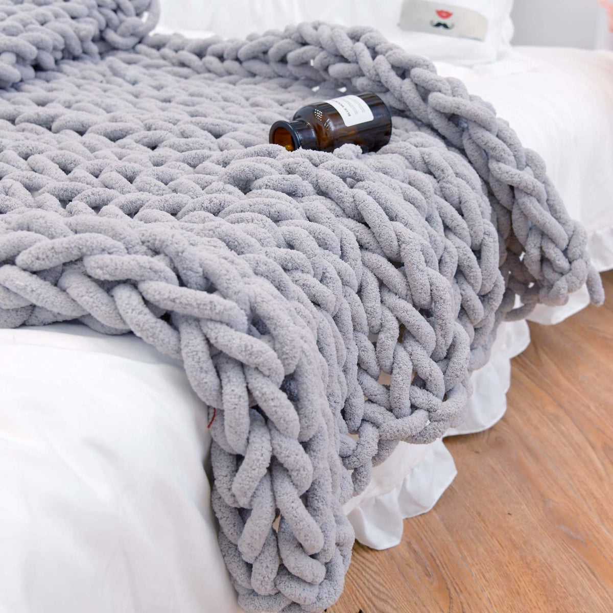 MocaDng Chunky Knit Blanket 40x40 on sofa adds cozy warmth and style.