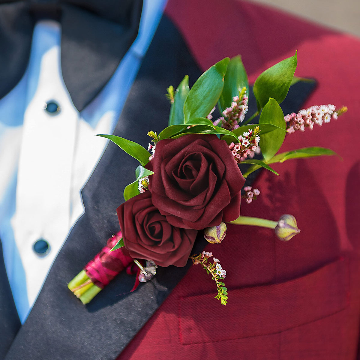 Mocoosy 50pcs burgundy roses with 8 complimentary leaves included.
