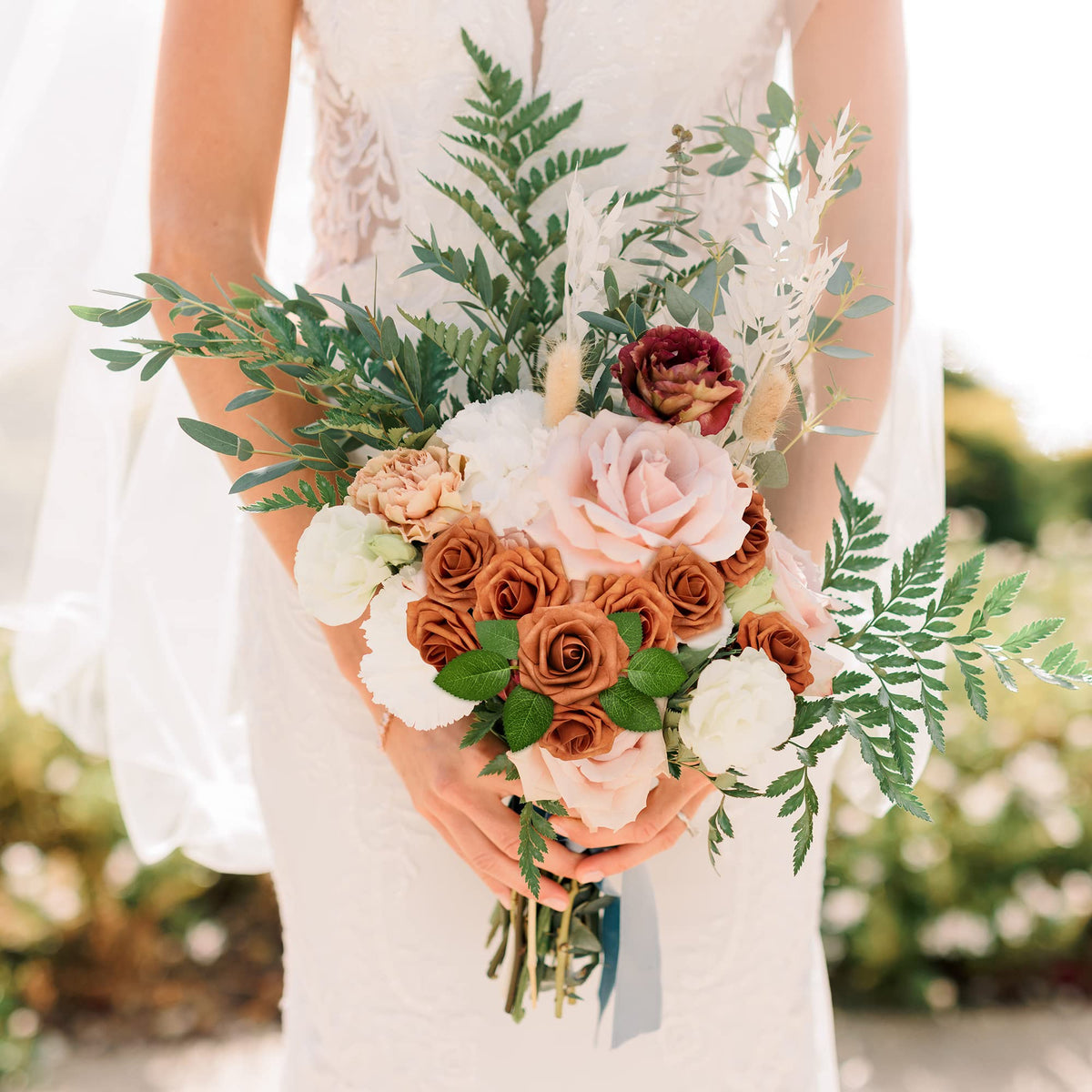 Mocoosy bridal shower decor using burnt orange roses for festive vibe