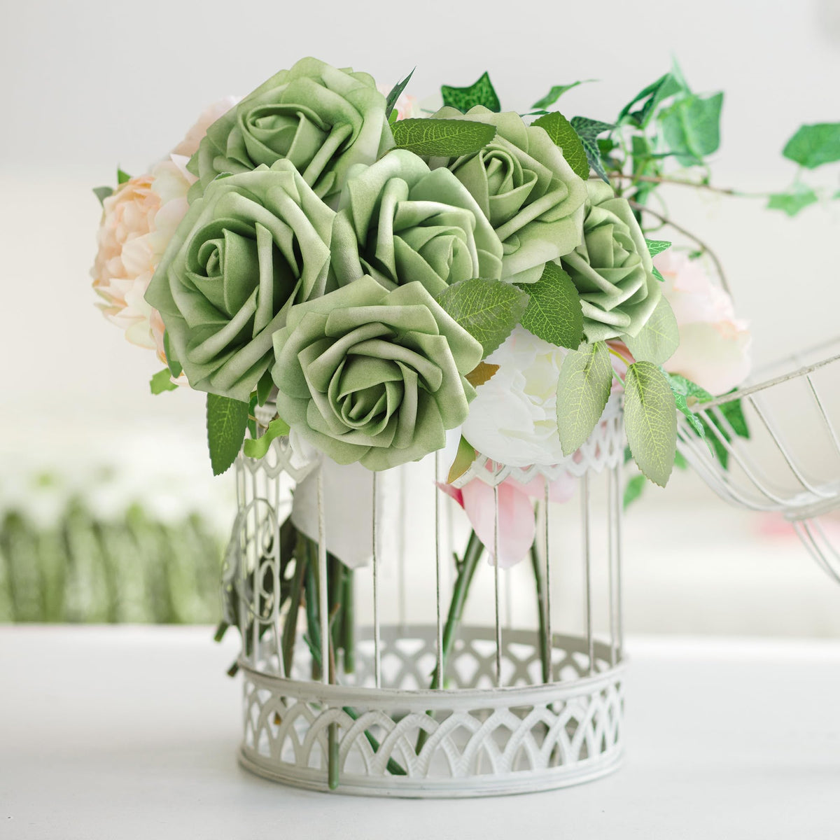 Mocoosy bridal shower sage-green roses add elegant floral decor.