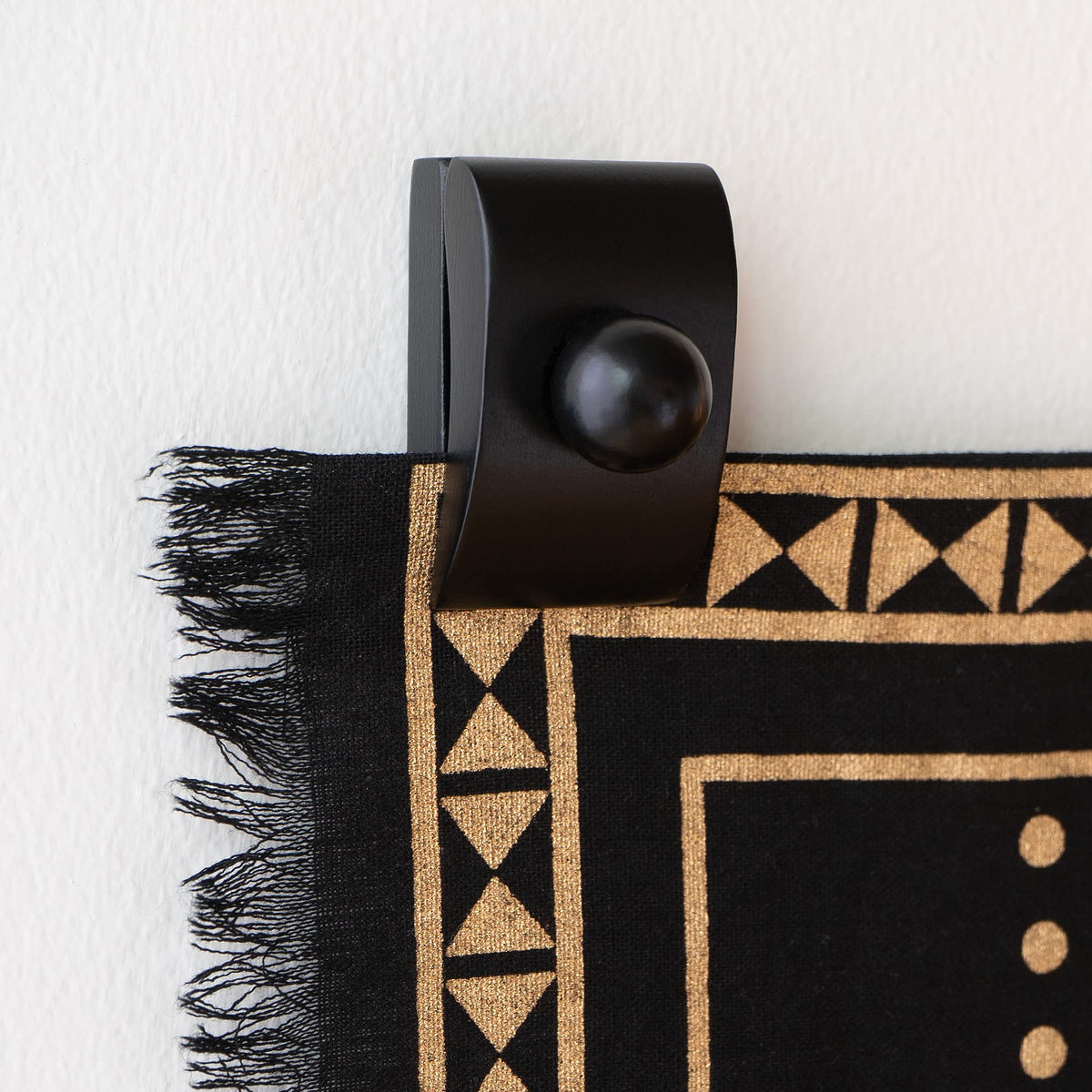 MOCTUS easy-use wall hanger system simplifies hanging textiles