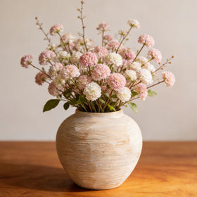 MoCuishle vase ribbed textured clay close-up, adds tactile elegance to any shelf.