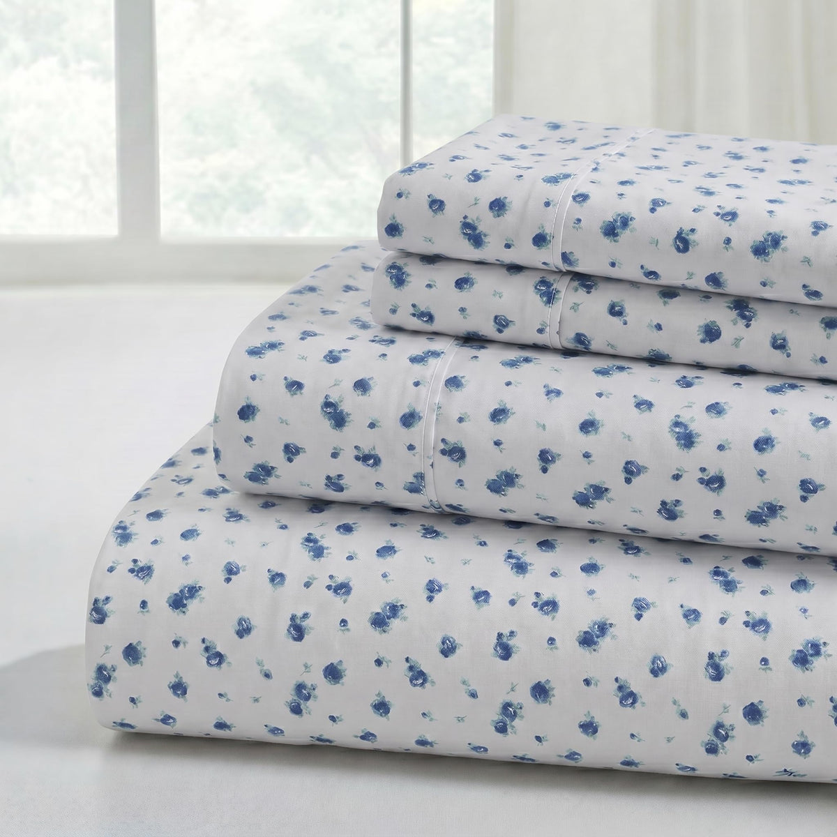 Modern Threads Blue Roses sheet set laid flat, showing soft microfiber and smooth texture.