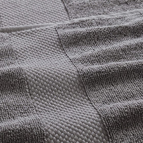 Modern Threads care charcoal machine wash image indicates easy care and long-lasting fibers