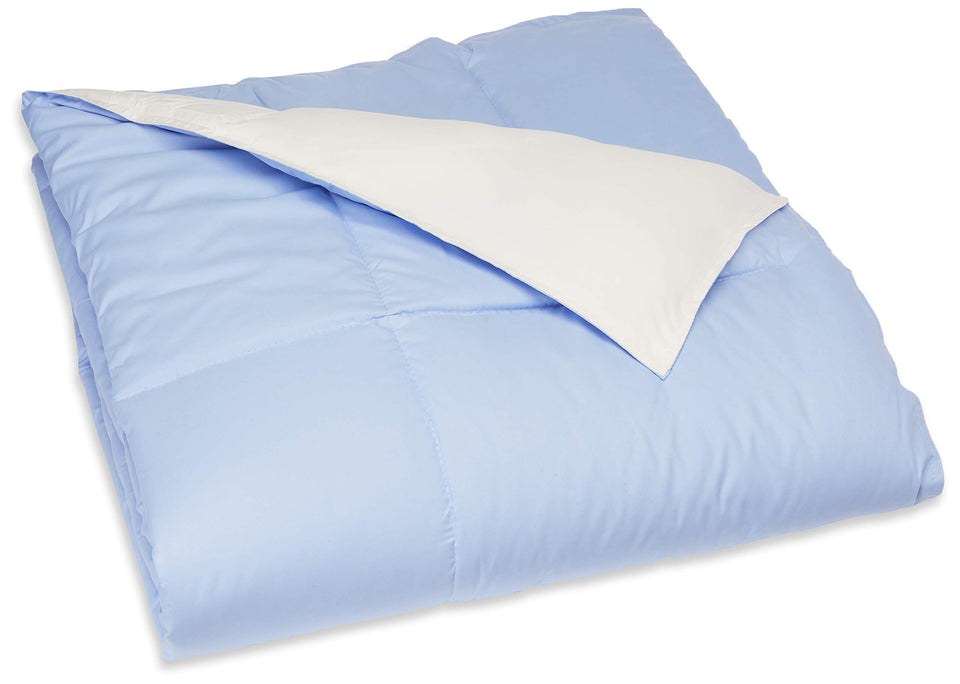Modern Threads Down Alternative Reversible Comforter in blue-and-cream on a twin bed for all-season warmth