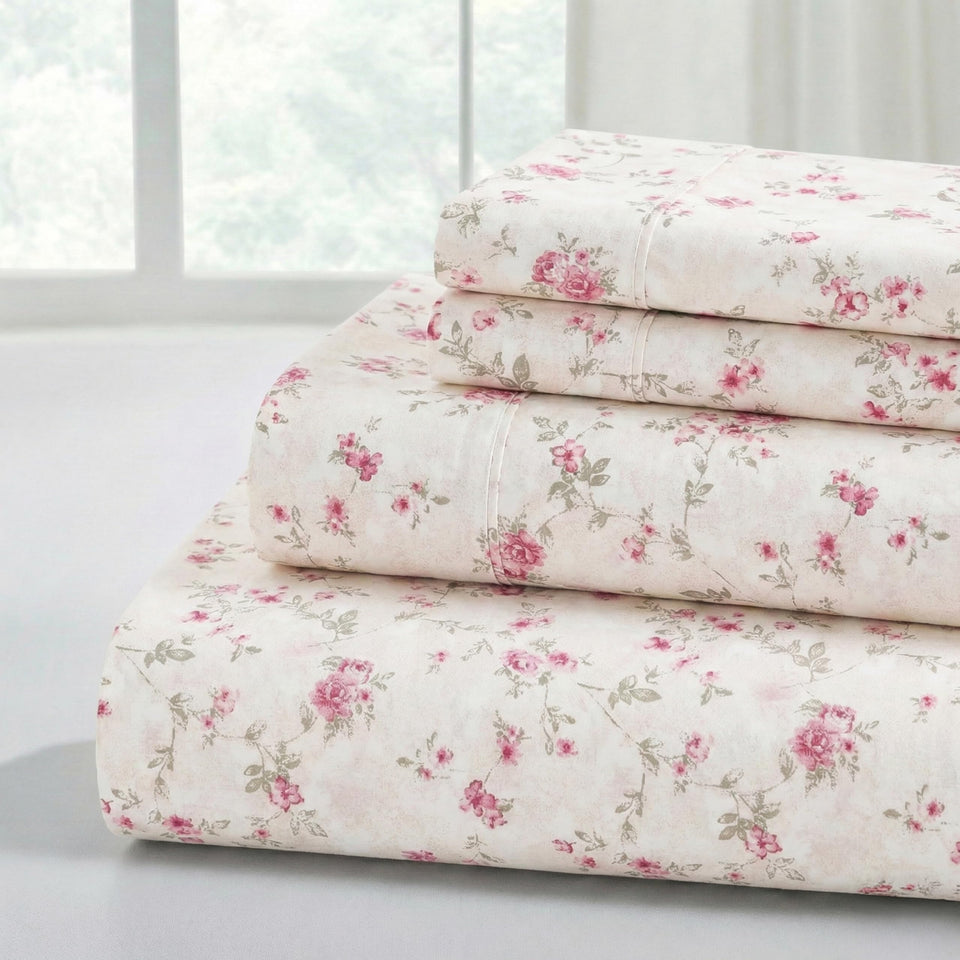 Modern Threads Floral Rose sheets on a bed, showcasing elegant all-season softness.