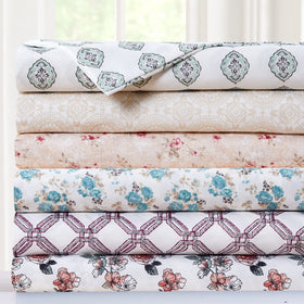 Bedroom scene with Modern Threads Forever Roses bedding for a refreshed look.