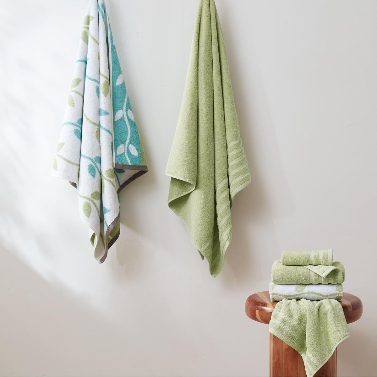 Modern Threads Natural Vine hand towel in sage green with jacquard texture.