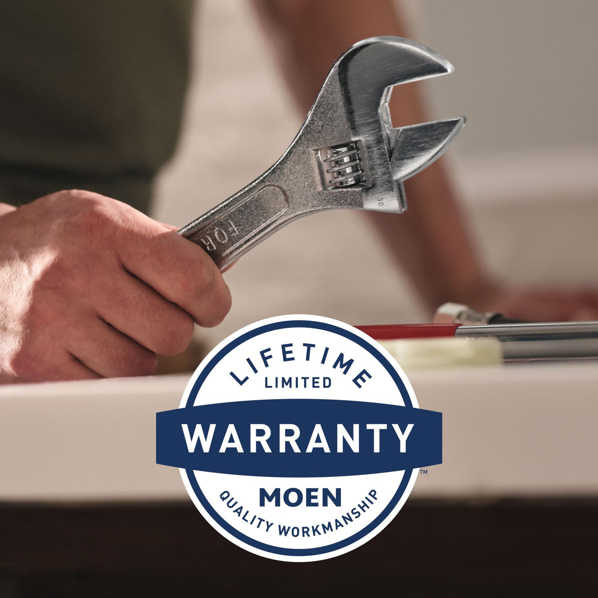 Brushed nickel Moen rod adds warm, durable bathroom styling