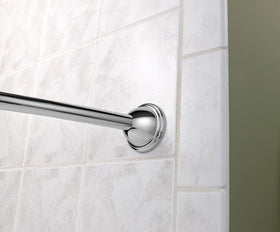 Moen brushed nickel curved rod complements modern bathroom decor