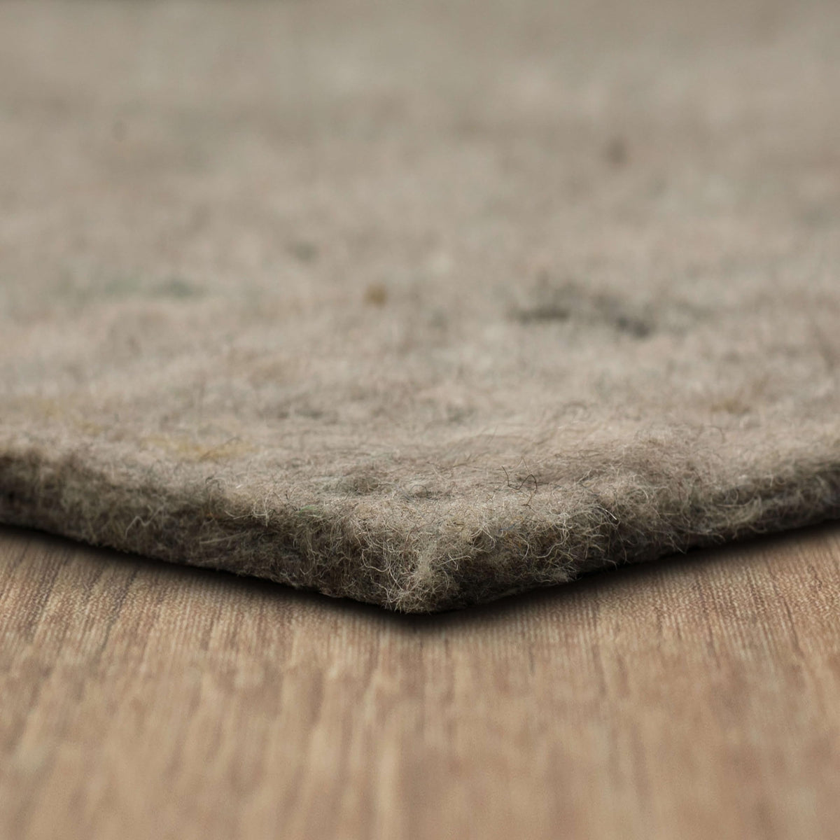 Mohawk Home felt rug pad 8x10 cushion close-up shows plush underfoot comfort and floor protection.