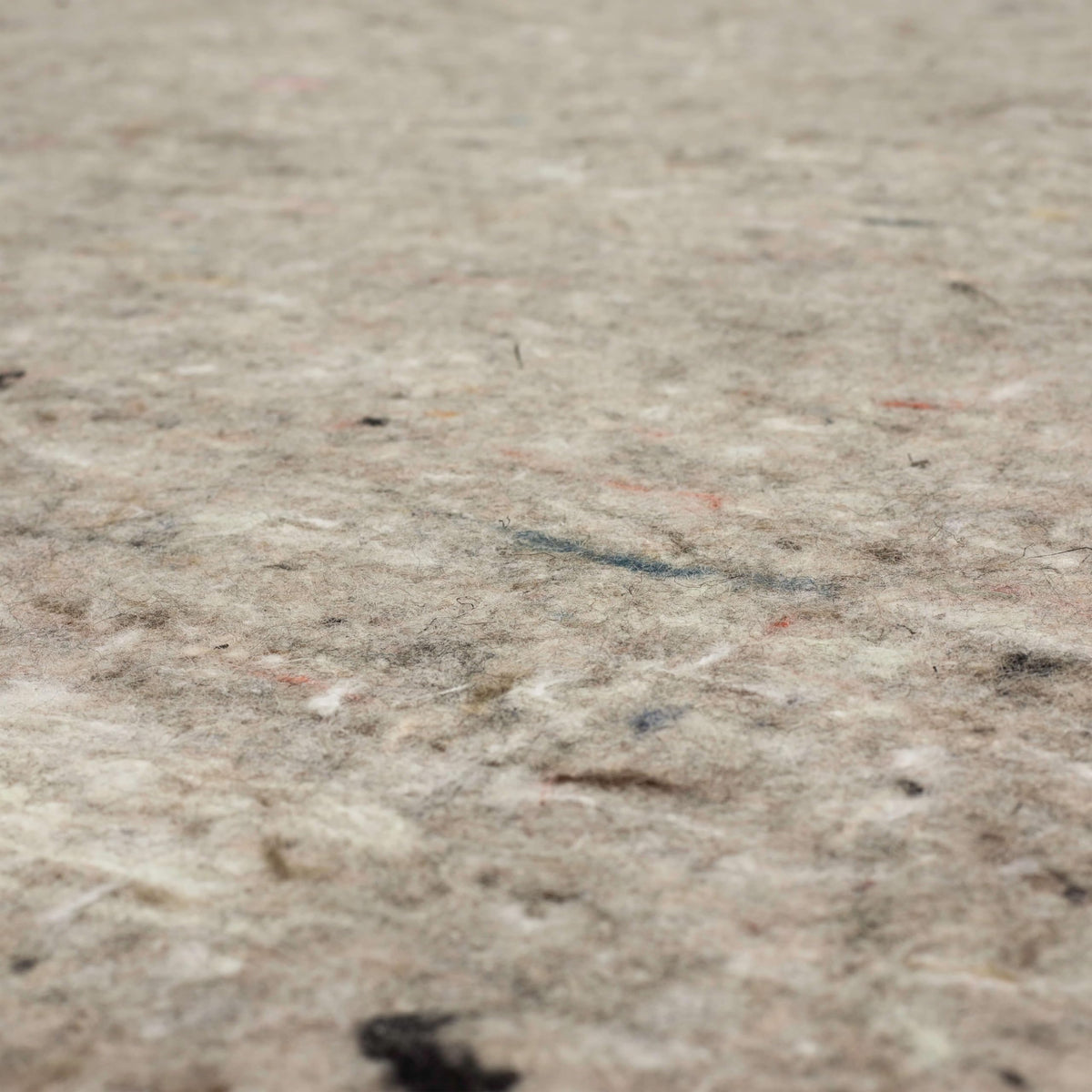 Felt-only backing of Mohawk Home rug pad with no latex backing.